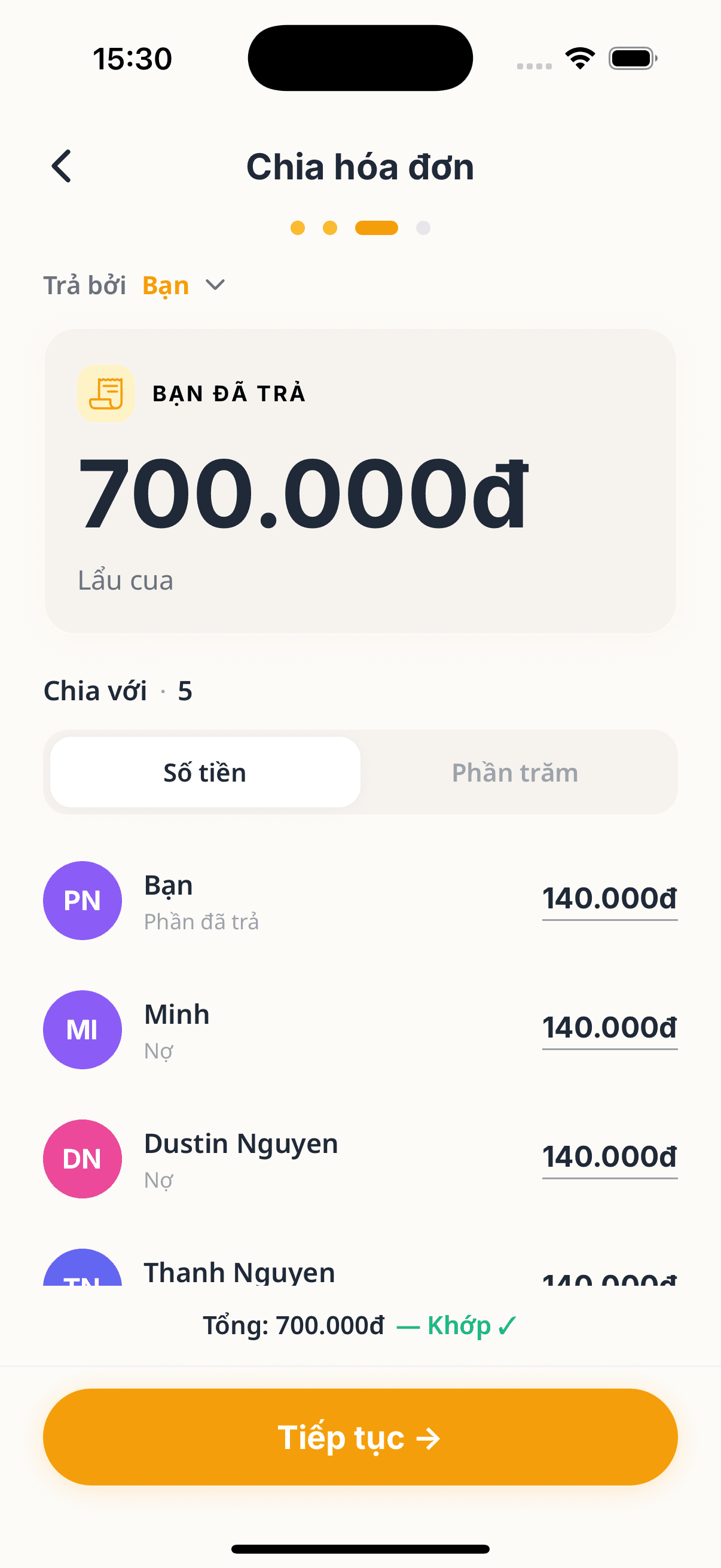Bill split evenly among 5 people, 700,000đ total matches